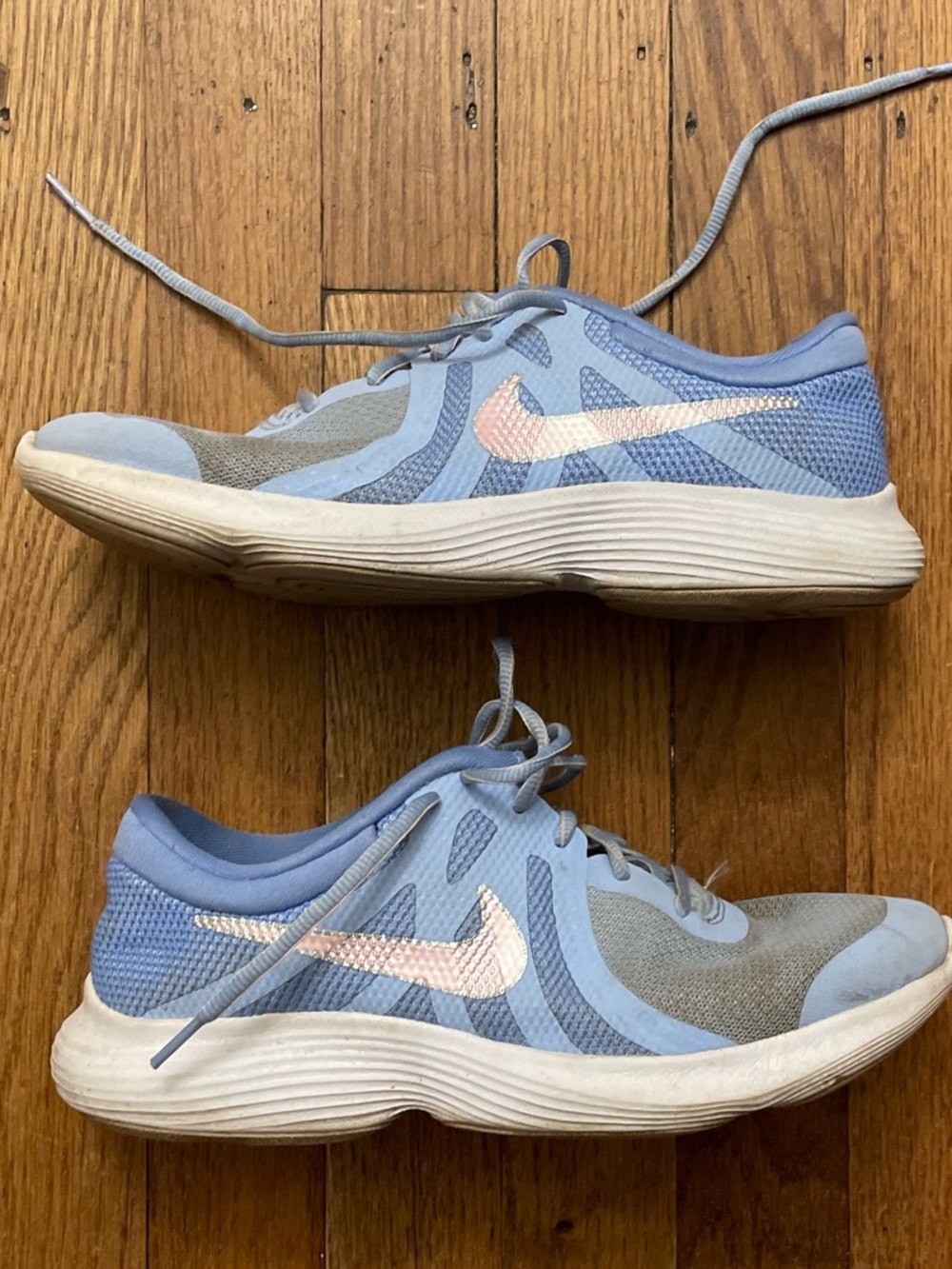 Nike Youth Light Blue Running Shoes with Pink Swoosh size 6